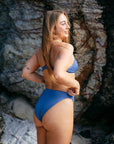 JAYD Swimwear model Cass wearing the mid-coverage, high waisted Tahiti Bikini Bottom.