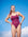 Surf life saving athlete Jasmine Rayward wearing the JAYD Swimwear Airlie one piece swimsuit in sangria.