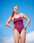Surf life saving athlete Jasmine Rayward wearing the JAYD Swimwear Airlie one piece swimsuit in sangria.