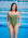 JAYD model Dom standing in front of a pool wearing the Albi one piece in Olive green with contrasting Neon orange straps.