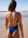 Back view of JAYD Swimwear Finley one piece swimsuit in navy with contrasting white shoulder and back straps.