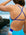 JAYD Swimwear model wearing the full coverage Mykonos blue Ibiza one piece swimsuit with contrasting cobalt semi-adjustable back and shoulder straps.