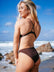 JAYD athlete Chloe wearing the high waist mid-coverage Tahiti Bikini Bottom in Cacao brown.