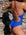 Athlete Lauren wears a Cobalt blue and Neon Orange Airlie One Piece fuller coverage swimsuit by JAYD Swimwear, with contrasting Neon Orange, White and Cobalt straps.